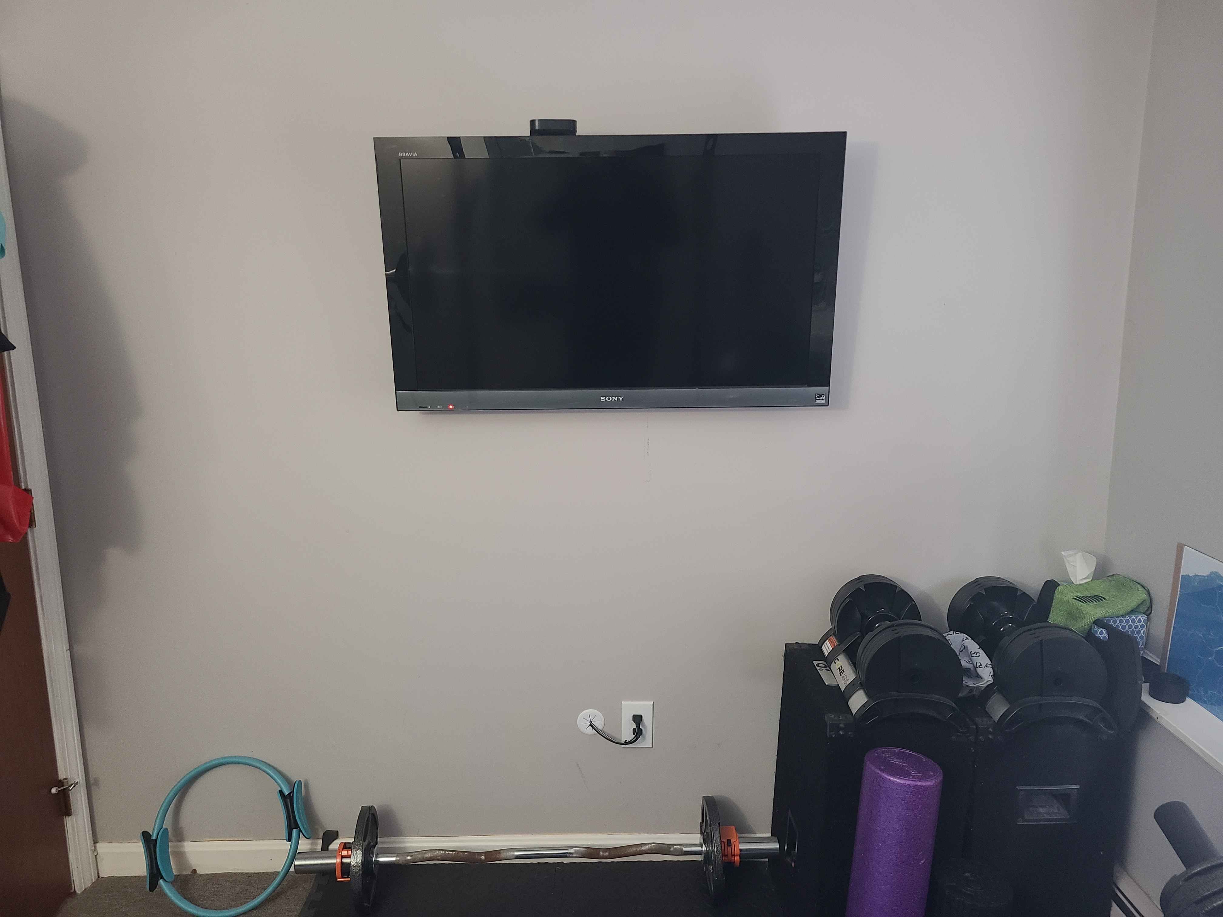 Professional gym TV wall mount installation in Somerville with concealed cables